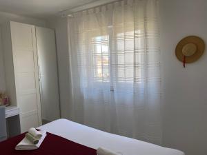 Postel nebo postele na pokoji v ubytování Apartment Lucia