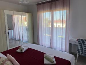 Postel nebo postele na pokoji v ubytování Apartment Lucia