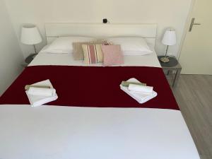 Postel nebo postele na pokoji v ubytování Apartment Lucia