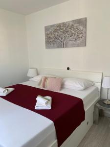 Postel nebo postele na pokoji v ubytování Apartment Lucia