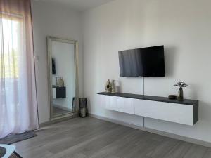 TV a/nebo společenská místnost v ubytování Apartment Lucia