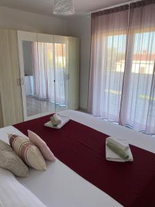 Postel nebo postele na pokoji v ubytování Apartment Lucia