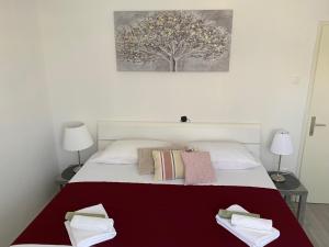 Postel nebo postele na pokoji v ubytování Apartment Lucia