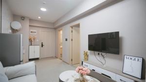 Serveyou International Apartment Hotel - Free Airport Pickup & Free Canton Fair shuttle & Paid City Tour TV 또는 엔터테인먼트 센터