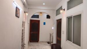 a hallway of a building with a door at Ali Baba Hostel in Jaipur