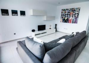 TV a/nebo společenská místnost v ubytování Casa Entremares