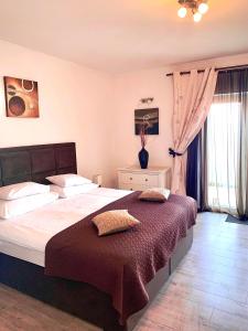 Postel nebo postele na pokoji v ubytování Apartments Casa Toni Dubrovnik