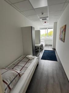 Postel nebo postele na pokoji v ubytování DRIVER ROOMS