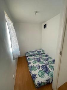 Кровать или кровати в номере tadzmahal home