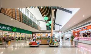 a shopping mall with a lot of stores at MJED House in Ingleburn