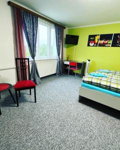 Posteľ alebo postele v izbe v ubytovaní Apartmány MK u MODRÉ KOČKY