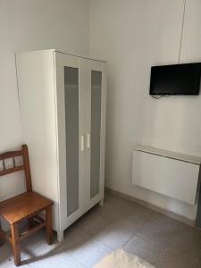 TV a/nebo společenská místnost v ubytování Hostal La Masia + 37 fotografií