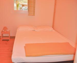 Katil atau katil-katil dalam bilik di Camping Cala Nova