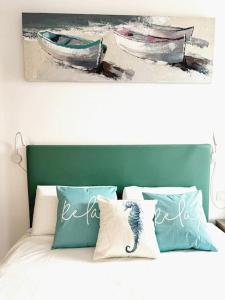 a picture of two boats on a bed at CASA LORENZO in the center in Playa Blanca