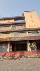 a building with a sign that reads hotel durango palace at Hotel dwarka palace in Darbhanga