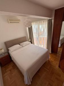 Ein Bett oder Betten in einem Zimmer der Unterkunft Villa Spomenka