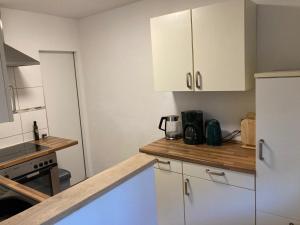 Η κουζίνα ή μικρή κουζίνα στο Gemütliches Ferienhaus 70qm mit Garten Sitzecke Grill 5 Minuten zum See +10 φωτογραφίες