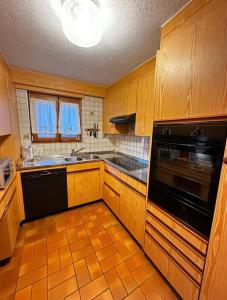 Kuchyň nebo kuchyňský kout v ubytování Appartement 4 p Centre Villars