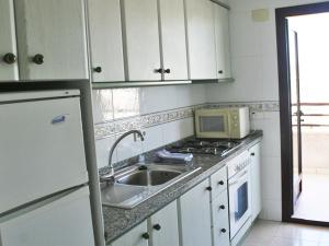 Kuchnia lub aneks kuchenny w obiekcie Apartamentos Topacio Unitursa