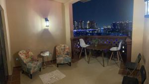 Area soggiorno di 2 BHK Townhouse at Pearl