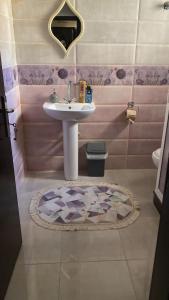 Et badeværelse på Zefta NH Guest House