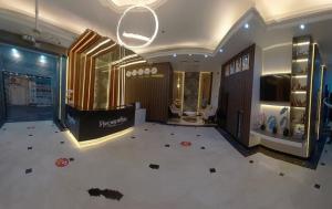 a fashion store with a large room with aumedumedumed at The Grand Blue Sky in Dubai