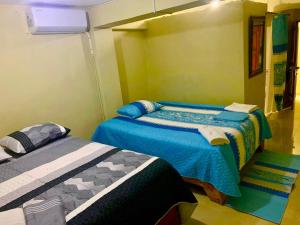 Кровать или кровати в номере Hotel familiar Doña Nida
