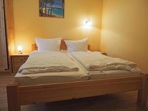 Ένα ή περισσότερα κρεβάτια σε δωμάτιο στο Ferienhaus Mandy +9 φωτογραφίες