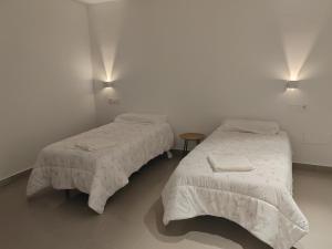Ένα ή περισσότερα κρεβάτια σε δωμάτιο στο Increible Loft en el Corazon de Lorca