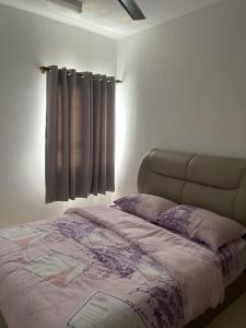 Katil atau katil-katil dalam bilik di MEK Homestay