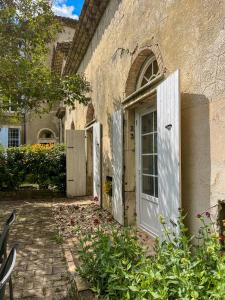 Κήπος έξω από το Gîte de l'orangerie du Château de la Bégude de Mazenc +17 φωτογραφίες