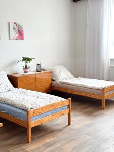 Postel nebo postele na pokoji v ubytování Apartmán JP