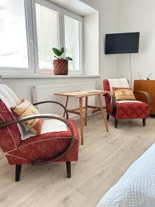 TV a/nebo společenská místnost v ubytování Apartmán JP