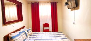 Letto o letti in una camera di guesthouse emaly