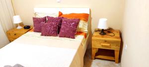 Letto o letti in una camera di guesthouse emaly