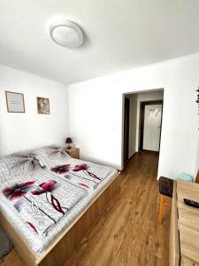 Postel nebo postele na pokoji v ubytování Casa D'ANA