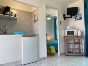 Kuchyň nebo kuchyňský kout v ubytování Residence Motel Corsicana