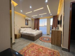 Postel nebo postele na pokoji v ubytování Pyramids Hotel + 37 fotografií