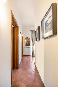 a hallway with a tiled floor in a house at Country House nella Winery in Frascati
