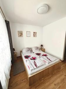 Postel nebo postele na pokoji v ubytování Casa D'ANA