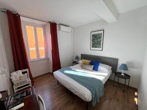 a bedroom with a bed and a window at Charming Navona in Rome