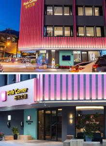 花蓮市にある花蓮品悅文旅Hualien Pink Corner Hotelのピンクと白の建物