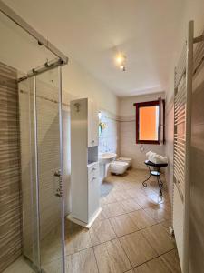 Ένα μπάνιο στο Angelina House Cisano