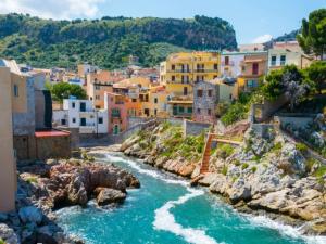 a view of a town with a river and buildings at Donna Carmela in Porticello