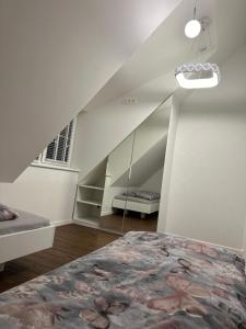 Ένα ή περισσότερα κρεβάτια σε δωμάτιο στο Namukas Karklėje