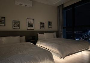 Postel nebo postele na pokoji v ubytování DD Condominium 2Bedroom Sea view Georgetown Penang