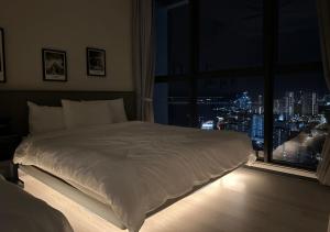 Postel nebo postele na pokoji v ubytování DD Condominium 2Bedroom Sea view Georgetown Penang