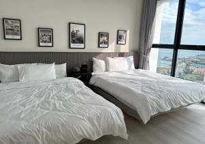 Postel nebo postele na pokoji v ubytování DD Condominium 2Bedroom Sea view Georgetown Penang