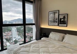 Postel nebo postele na pokoji v ubytování DD Condominium 2Bedroom Sea view Georgetown Penang