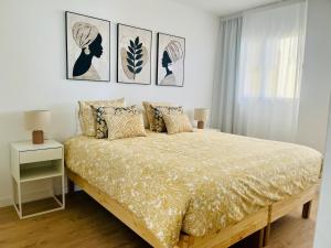 Voodi või voodid majutusasutuse Sunset Ocean View toas